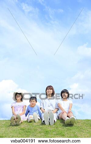Japanese mum and kids on a hill View Large Photo Image Stock Image - Japanese mum and kids on a hill. Fotosearch