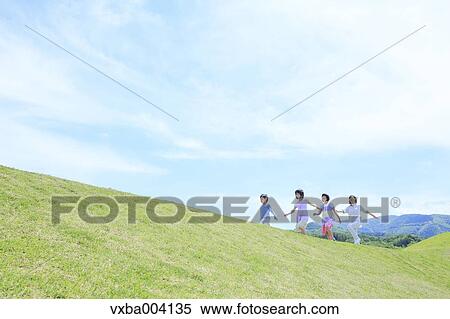 Japanese mum and kids on a hill View Large Photo Image Stock Photography - Japanese mum and kids on a hill. Fotosearch