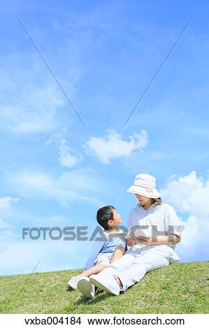 Japanese mum and son on a hill View Large Photo Image Picture - Japanese mum and son on a hill. Fotosearch