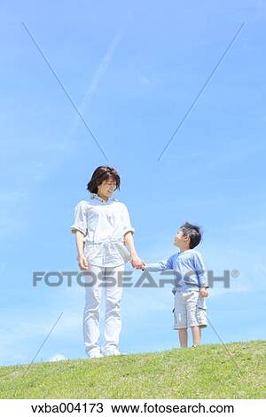 Japanese mum and son on a hill View Large Photo Image Stock Image - Japanese mum and son on a hill. Fotosearch