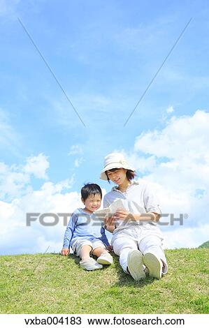 Japanese mum and son on a hill View Large Photo Image Stock Image - Japanese mum and son on a hill. Fotosearch