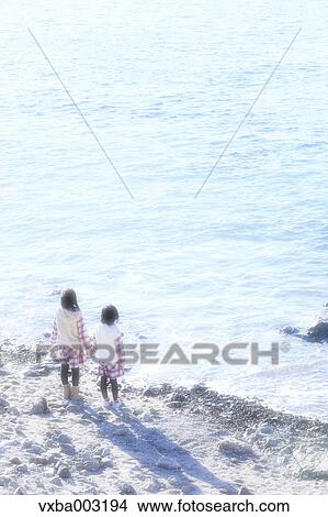 Kids by the sea View Large Photo Image Picture - Kids by the sea. Fotosearch
