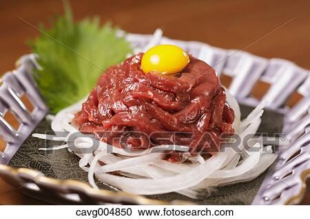 Stock Image - Korean style horse tartare. Fotosearch