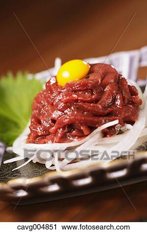 Stock Image - Korean style horse tartare. Fotosearch