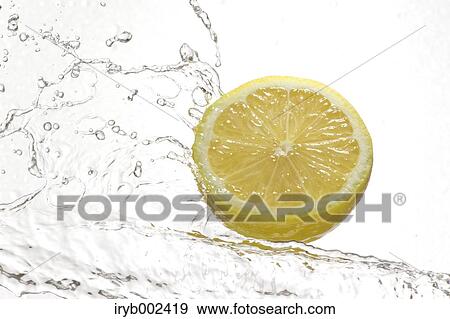 Lemon and water splash View Large Photo Image Stock Photo - Lemon and water splash. Fotosearch