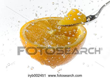 Orange and water splash View Large Photo Image Stock Image - Orange and water splash. Fotosearch