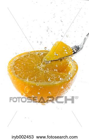 Orange and water splash View Large Photo Image Stock Image - Orange and water splash. Fotosearch