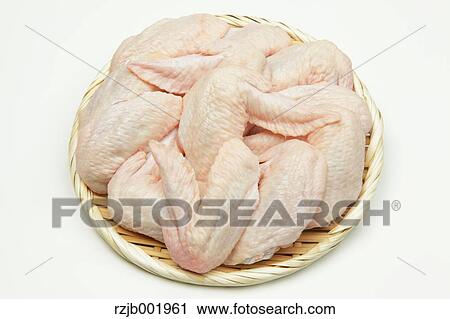 Stock Image - Raw chicken wings. Fotosearch