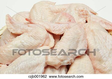Stock Image - Raw chicken wings. Fotosearch