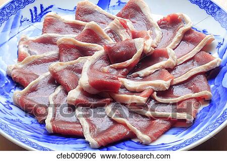 Stock Photograph - Raw duck meat. Fotosearch