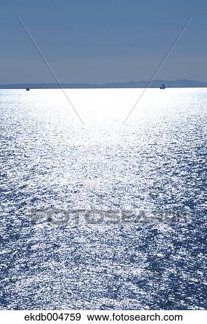 Stock Photo - Reflections on the sea, Chiba Prefecture, Japan. Fotosearch