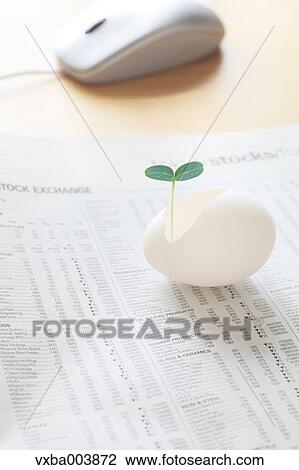 Sprouting leaf and newspaper View Large Photo Image Stock Image - Sprouting leaf and newspaper. Fotosearch