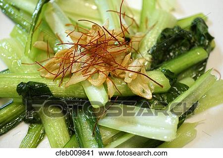 Stock Image - Stir-fried Japanese Mustard Spinach. Fotosearch