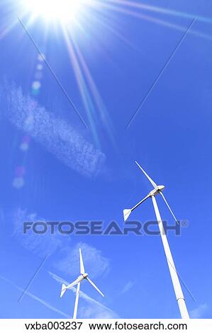 Stock Photo - Wind turbines and sky. Fotosearch