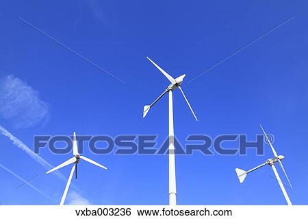 Wind turbines and sky View Large Photo Image Stock Photograph - Wind turbines and sky. Fotosearch