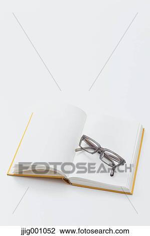 Book and glasses View Large Photo Image Stock Image - Book and glasses. Fotosearch