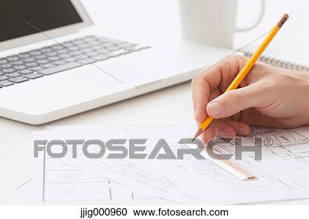 Close up of male hand working in the office View Large Photo Image Stock Image - Close up of male hand working in the office. Fotosearch
