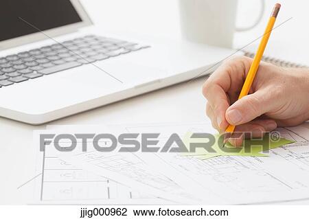 Close up of male hand working in the office View Large Photo Image Stock Image - Close up of male hand working in the office. Fotosearch
