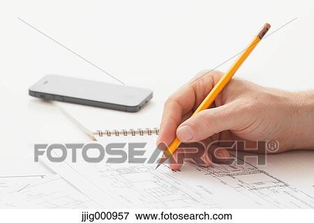 Close up of male hand working in the office View Large Photo Image Stock Photo - Close up of male hand working in the office. Fotosearch