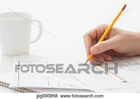 Close up of male hand working in the office View Large Photo Image Stock Photo - Close up of male hand working in the office. Fotosearch