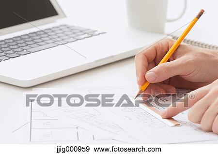 Close up of male hand working in the office View Large Photo Image Stock Photo - Close up of male hand working in the office. Fotosearch