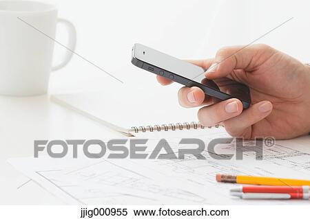 Close up of male hand working in the office View Large Photo Image Stock Photography - Close up of male hand working in the office. Fotosearch