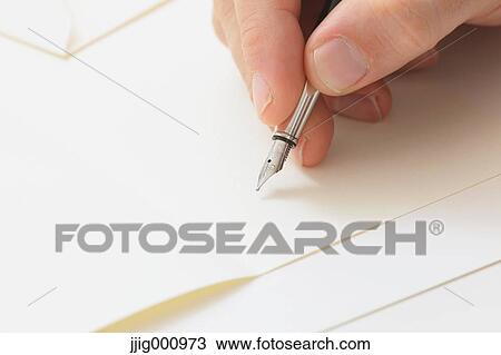 Close up of male hand writing on paper View Large Photo Image Stock Image - Close up of male hand writing on paper. Fotosearch