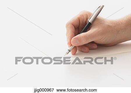 Close up of male hand writing on paper View Large Photo Image Stock Photo - Close up of male hand writing on paper. Fotosearch