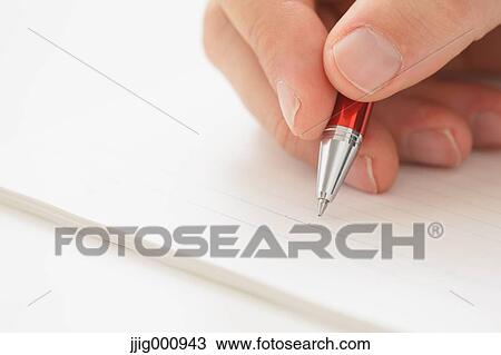 Close up of male hand writing on notebook View Large Photo Image Stock Image - Close up of male hand writing on notebook. Fotosearch