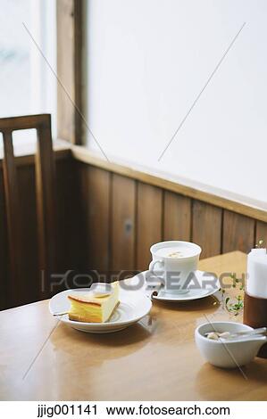 Stock Image - Coffee and cake . Fotosearch
