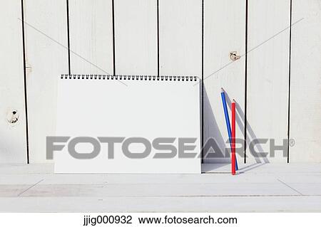 Colored pencils and sketchbooks against white wooden wall View Large Photo Image Stock Image - Colored pencils and sketchbooks against white wooden wall. Fotosearch