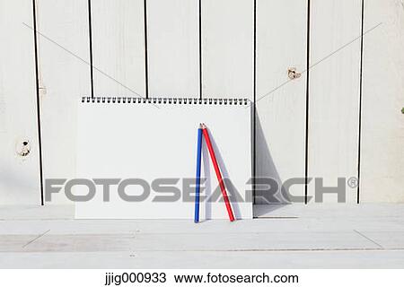 Colored pencils and sketchbooks against white wooden wall View Large Photo Image Stock Image - Colored pencils and sketchbooks against white wooden wall. Fotosearch
