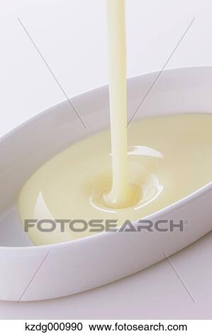 Condensed milk View Large Photo Image Stock Image - Condensed milk . Fotosearch