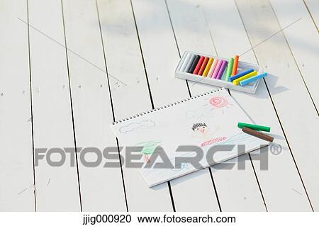 Crayons and drawing on white wooden flooring View Large Photo Image Stock Image - Crayons and drawing on white wooden flooring. Fotosearch