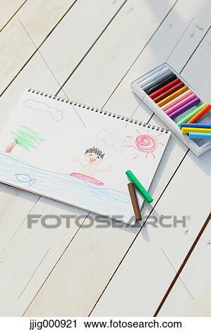 Crayons and drawing on white wooden flooring View Large Photo Image Stock Image - Crayons and drawing on white wooden flooring. Fotosearch