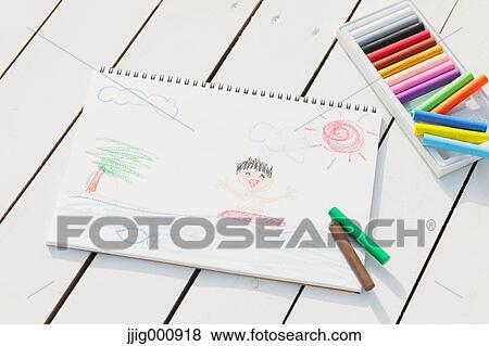 Crayons and drawing on white wooden flooring View Large Photo Image Stock Photo - Crayons and drawing on white wooden flooring. Fotosearch