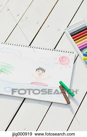 Crayons and drawing on white wooden flooring View Large Photo Image Stock Photo - Crayons and drawing on white wooden flooring. Fotosearch