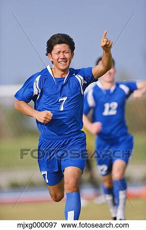 Football player cheering View Large Photo Image Stock Photo - Football player cheering. Fotosearch
