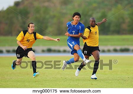 Football players running View Large Photo Image Stock Photography - Football players running. Fotosearch