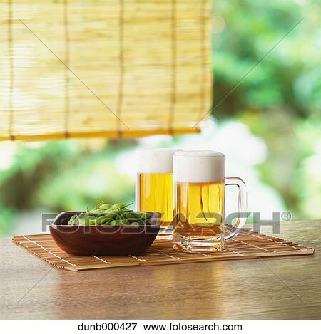 Green soybeans and beer View Large Photo Image Stock Photo - Green soybeans and beer. Fotosearch
