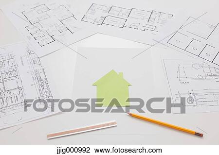 House construction drawings on white table View Large Photo Image Stock Image - House construction drawings on white table. Fotosearch