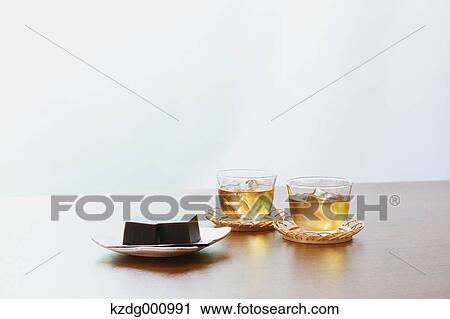 Stock Image - Jelly and barley tea . Fotosearch