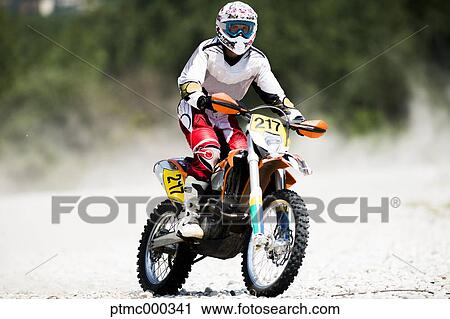 Man Riding Enduro Bike on Stony Trail View Large Photo Image Stock Image - Man Riding Enduro Bike on Stony Trail. Fotosearch