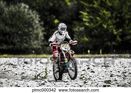 Man Riding Enduro Bike on Stony Trail View Large Photo Image Stock Image - Man Riding Enduro Bike on Stony Trail. Fotosearch