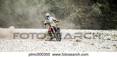 Man Riding Enduro Bike on Stony Trail View Large Photo Image Stock Image - Man Riding Enduro Bike on Stony Trail. Fotosearch