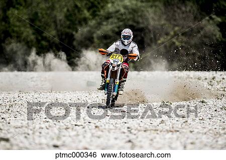 Man Riding Enduro Bike on Stony Trail View Large Photo Image Stock Photograph - Man Riding Enduro Bike on Stony Trail. Fotosearch
