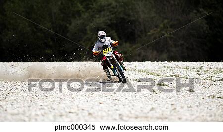 Man Riding Enduro Bike on Stony Trail View Large Photo Image Stock Photography - Man Riding Enduro Bike on Stony Trail. Fotosearch