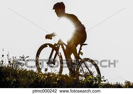 Man riding mountain bike in nature in the Bologna countryside, Italy View Large Photo Image Stock Image - Man riding mountain bike in nature in the Bologna countryside, Italy. Fotosearch