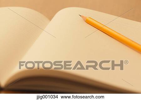 Notebook and pencil View Large Photo Image Picture - Notebook and pencil . Fotosearch