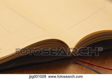 Notebook on table View Large Photo Image Stock Photo - Notebook on table. Fotosearch